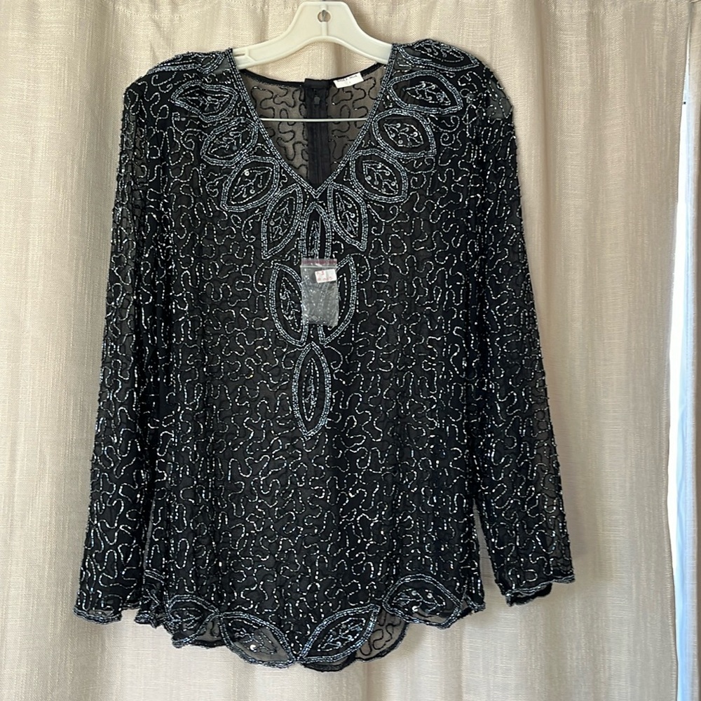 Beautiful elegant black top with embellishments